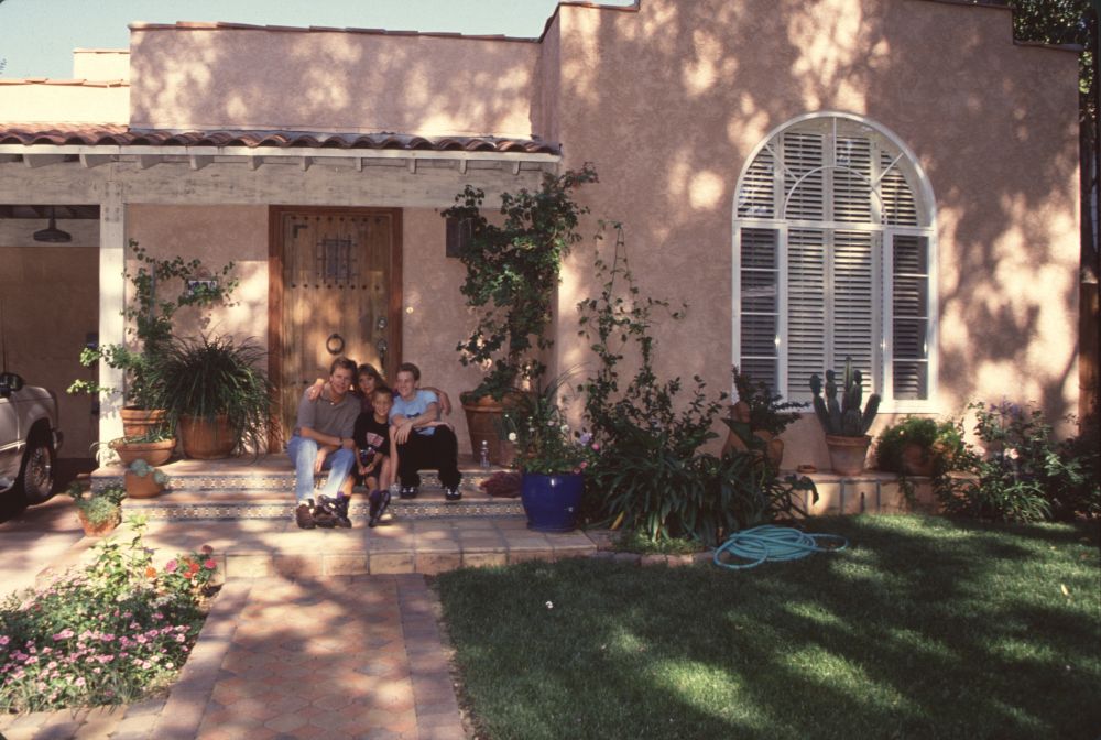 Brad Maule family photo print on front steps of home