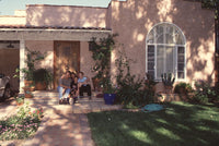Brad Maule family photo print on front steps of home