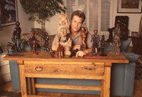 Brad Maule At Home With Wooden Figurines Photo Print