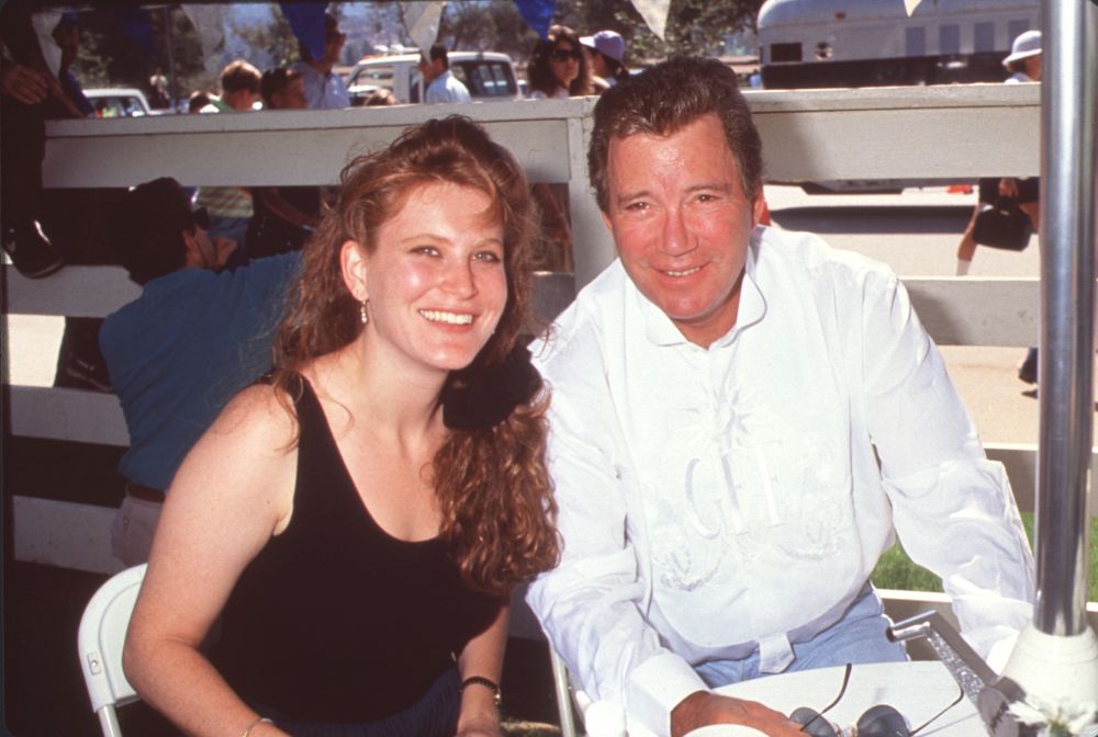 William Shatner sitting at a table with his daughter photo print.