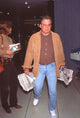 William Shatner at LAX holding newspapers photo print