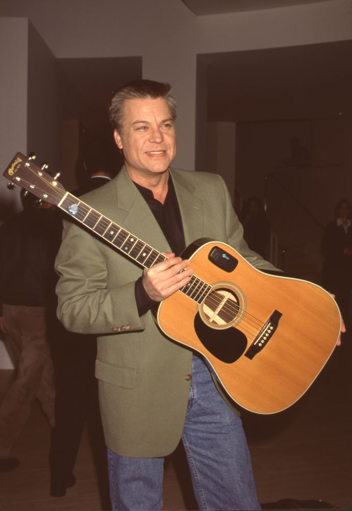 Brad Maule holding guitar at General Hospital album party photo print