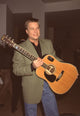 Brad Maule holding guitar at General Hospital album party photo print