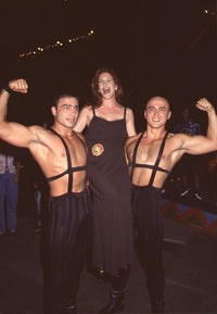 Melissa Gilbert in black dress with muscle men at Ringling Brothers Circus photo print.
