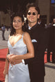 Constance Marie in a blue gown with Kent Katich at the 1998 Alma Awards Photo Print