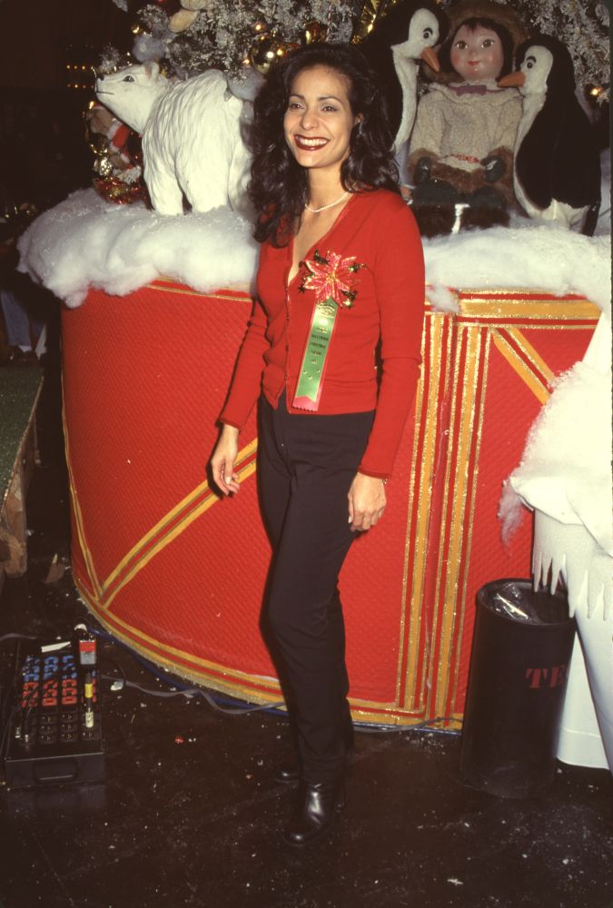 Constance Marie in front of a Christmas display at Hollywood Christmas Parade photo print