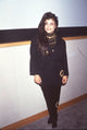 Paula Abdul in black suit with gold necklaces photo print