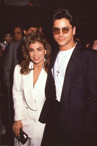 Paula Abdul in white suit with John Stamos in sunglasses photo print.