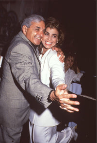 Harry Abdul hugging Paula Abdul in gray and white suits photo print.