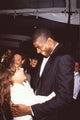 Paula Abdul laughing and hugging Magic Johnson photo print.