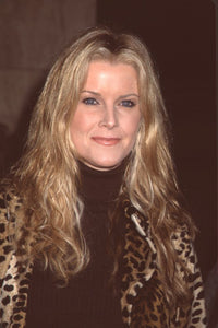 Maeve Quinlan closeup photo print in animal print coat from 'Mamma Mia' premiere.