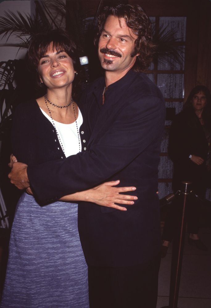 Photo print of Lisa Rinna in long blue skirt with Harry Hamlin at 'L.A. Law' wrap party.