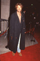 Harry Hamlin photo print in jeans and long trench coat at 'The Paper' premiere