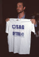 Noah Wyle holding 'Sag/Aftra' white shirt photo print.