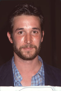 Close-up photo print of Noah Wyle in a blue plaid shirt