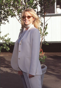 Courtney Thorne Smith photo print in white suit and sunglasses.