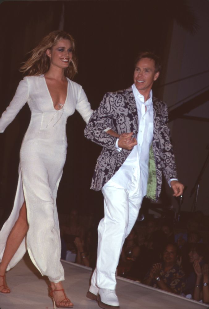 Rebecca Romijn and Tommy Hilfiger walking the runway at Rock to Erase MS party photo print.