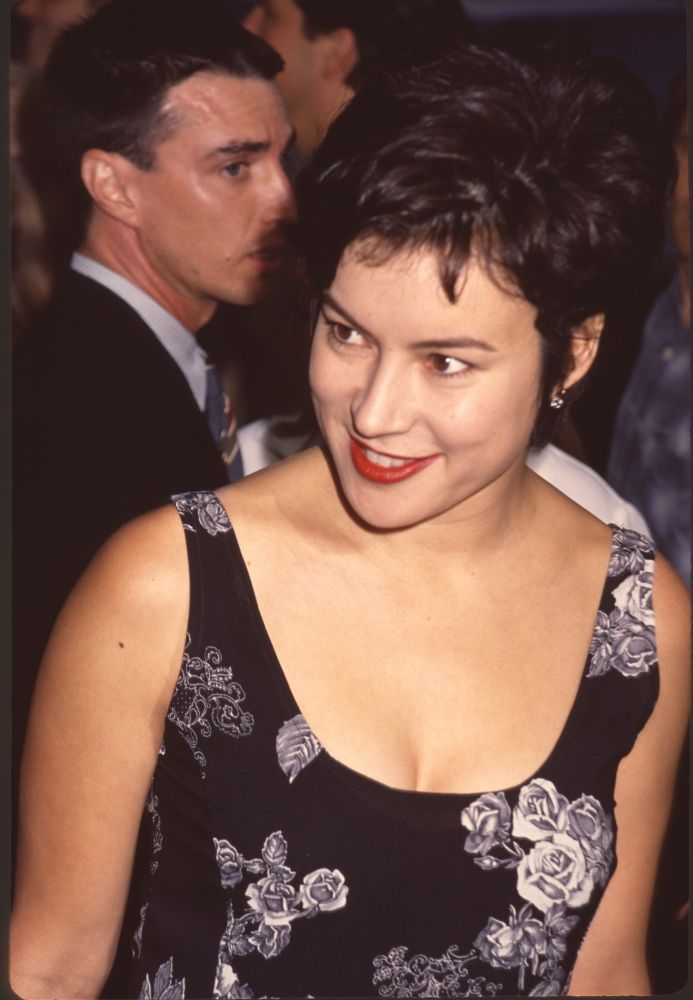 Jennifer Tilly close-up photo print in black dress with white roses at 'The Mask' premiere