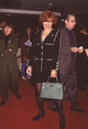 Jennifer Tilly in Black Suit with White Square Trim at Pelican Brief Screening Photo Print