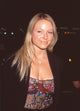 Jewel close-up photo print in black jacket and sheer floral top at Sleepy Hollow premiere.