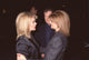 Mary Hart and Arianna Huffington hugging at S. Weitzman on Rodeo Drive photo print