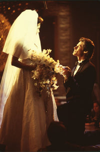Hunter Tylo in wedding dress and Ronn Moss on one knee photo print from The Bold and the Beautiful.