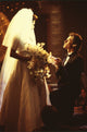Hunter Tylo in wedding dress and Ronn Moss on one knee photo print from The Bold and the Beautiful.