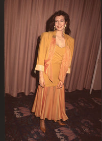 Hunter Tylo photo print in yellow outfit with scarf, elegant decor