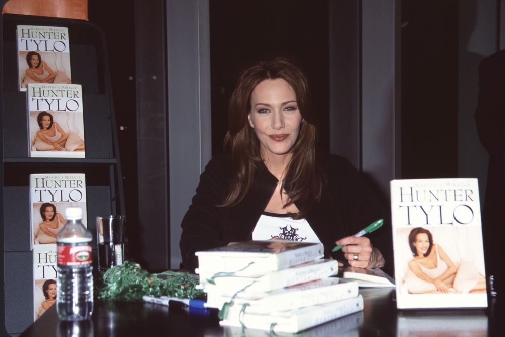 Hunter Tylo Signing Books Photo Print capturing the actress in action.