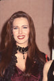 Hunter Tylo close-up photo print in purple velvet dress and black beaded choker.