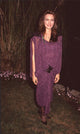 Hunter Tylo photo print in loose purple dress at Save The Planet event.