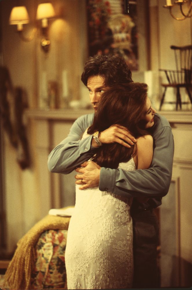 Ronn Moss hugging Hunter Tylo on the set of Bold and Beautiful - Photo Print