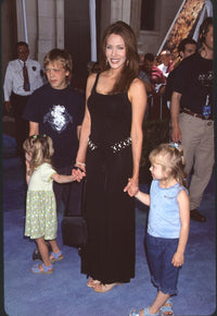 Hunter Tylo in black dress with children from Atlantis: Lost Empire photo print.