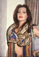 Hunter Tylo close-up photo print wearing snake and rainbow beaded outfit