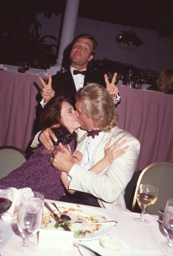 Hunter & Michael Tylo Kissing with Ray Combs Photo Print