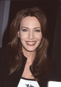 Hunter Tylo photo print at book signing in black jacket and white shirt.