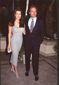 Hunter Tylo in gray dress with Michael Tylo in navy suit at Young & Restless 20th Anniversary Party photo print.
