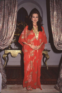 Hunter Tylo in a loose red and gold dress on set of Bold & Beautiful photo print