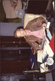 Michael Tylo Sitting at Desk in Brown Leather Jacket Photo Print