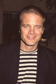 Close-up photo print of Michael Tylo in striped shirt and blazer.
