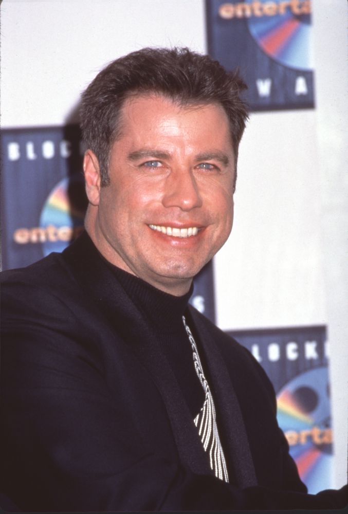 John Travolta close-up photo print in black suit at Blockbuster Awards
