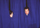 Sandra Bullock and John Travolta Peeking Out of Curtain Photo Print