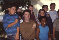 John Travolta with children at a Scientologist event photo print