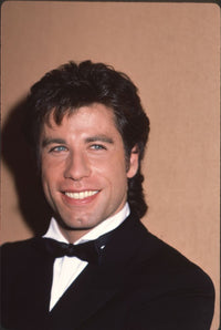 John Travolta close-up photo print in tuxedo and bowtie.