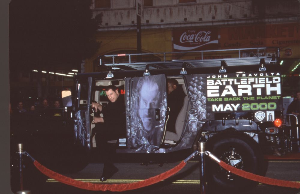 John Travolta in SUV at Battlefield Earth Premiere Photo Print