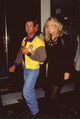 Sylvester Stallone in jeans and Planet Hollywood jacket with Susan Anton at the opening event.