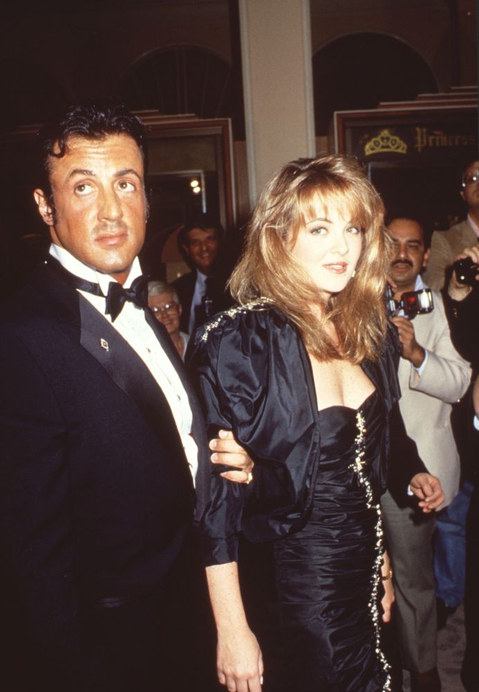 Sylvester Stallone in tuxedo with Cornelia Guest in black ruffle dress photo print.