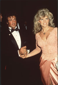 Sylvester Stallone in tuxedo with wife Sasha Czack in pink lace gown photo print.