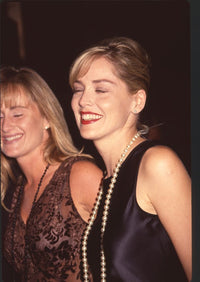 Sharon Stone close-up photo print featuring a silk black top and long pearl necklace.