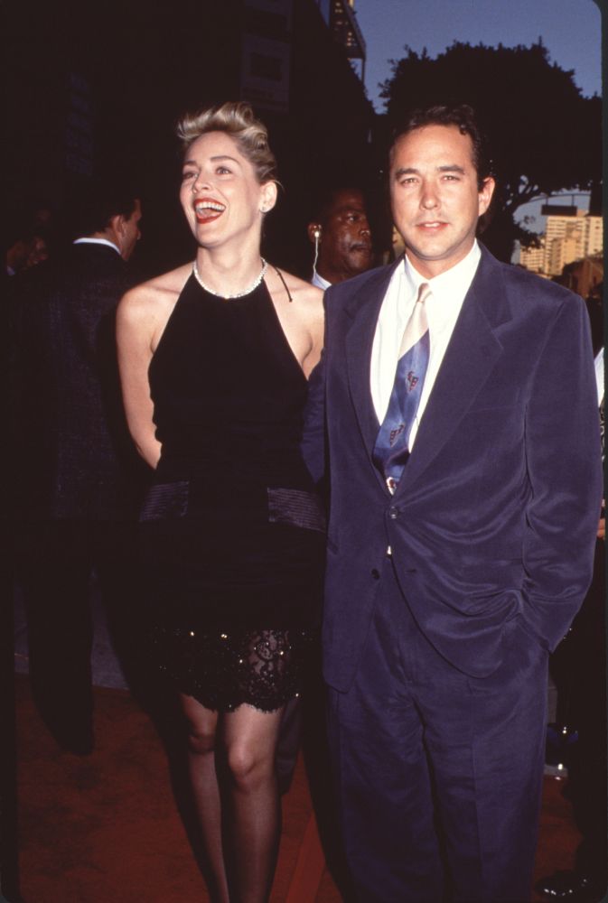 Sharon Stone in black sequin halter dress with Bill Macdonald at Silver Premiere photo print.